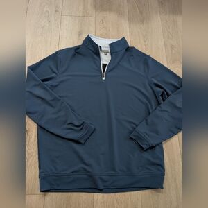 Peter Millar Perth Performance Quarter-Zip pullover in a navy blue color.